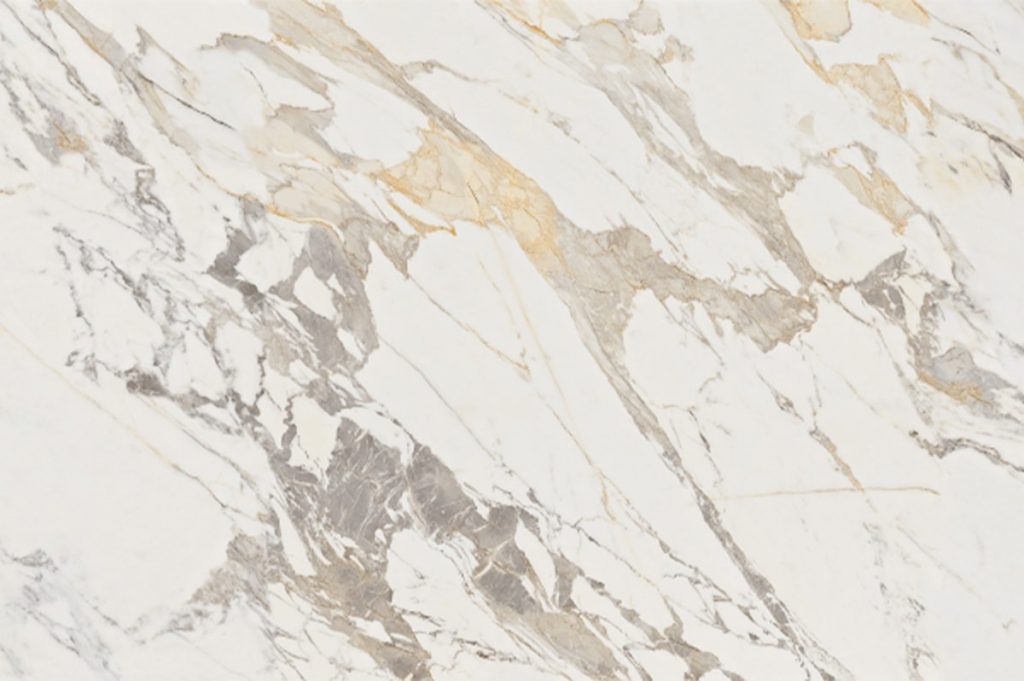 Consistent pattern of engineered Calacatta quartz slab, compared to natural stone.