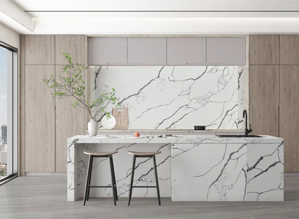 a kitchen with a black branches quartz countertop and stools